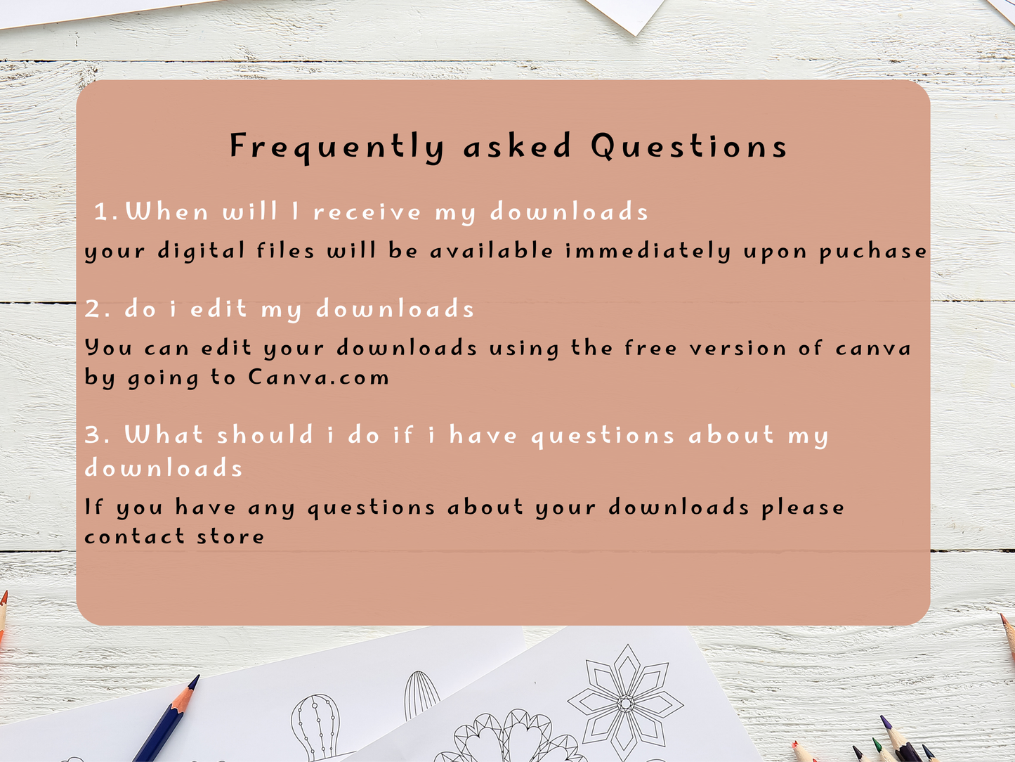 FAQ card on a wooden surface with stationery items