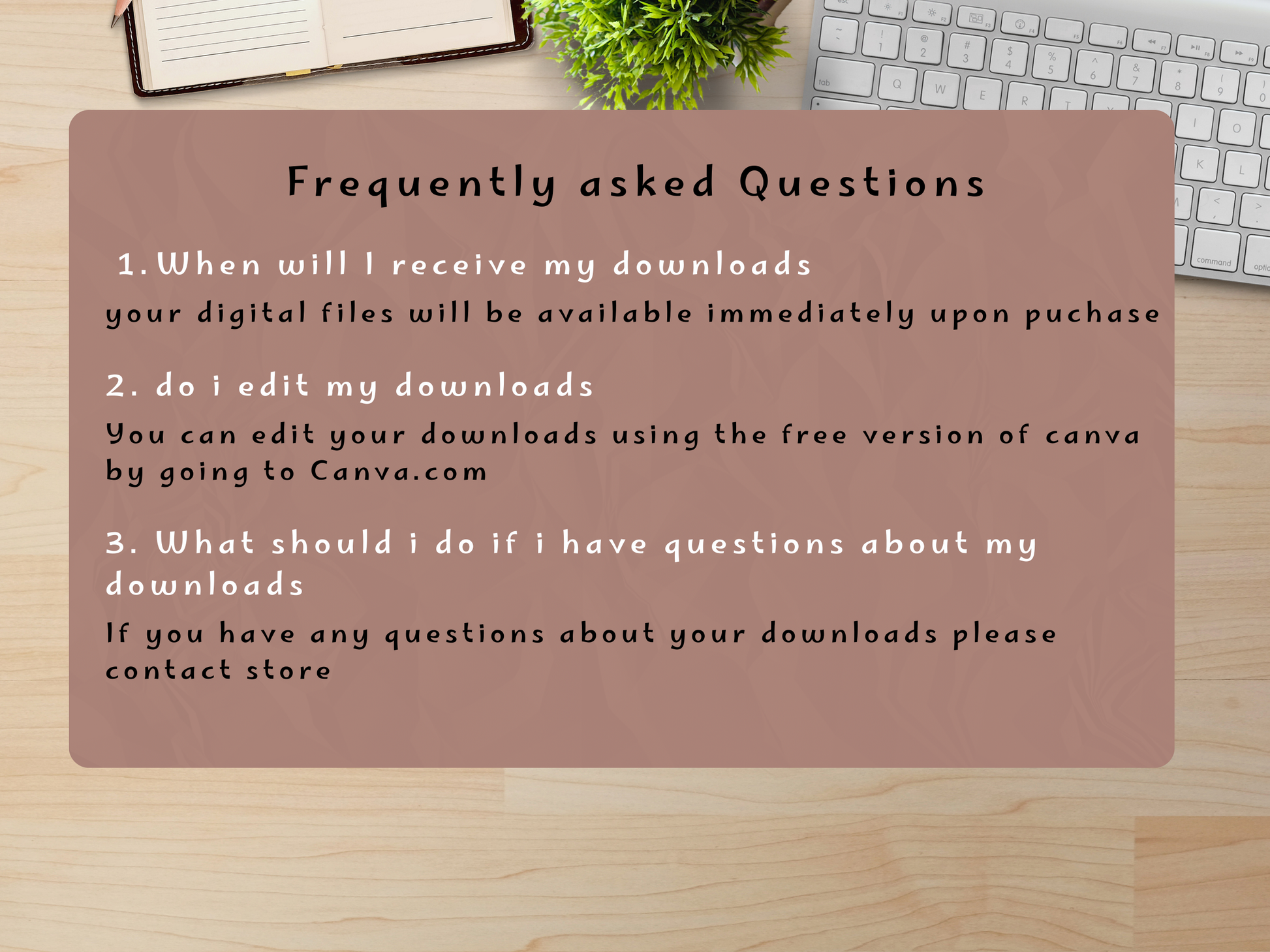 FAQ card on a desk with a keyboard and plant in the background