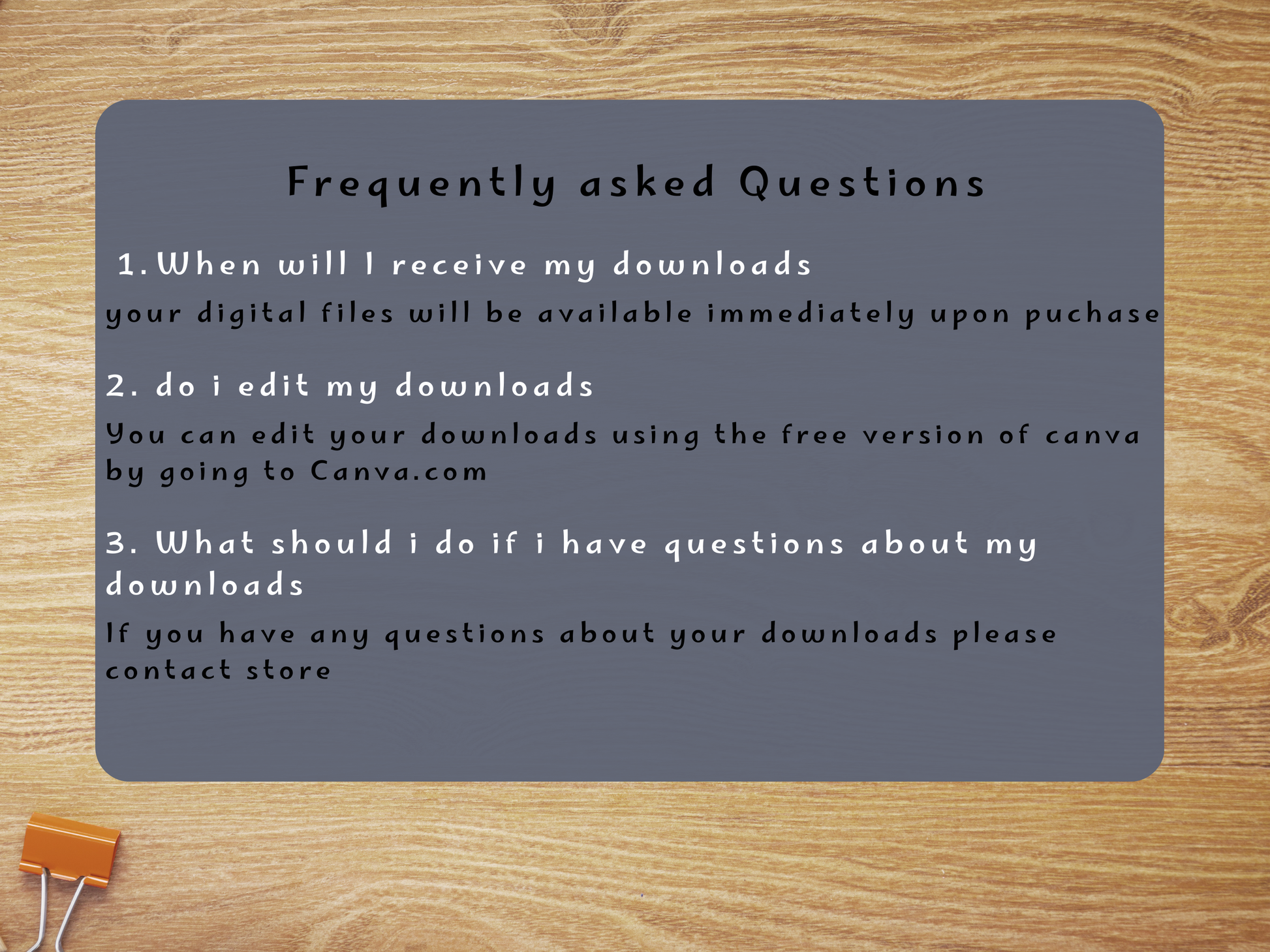 FAQ text on wooden background